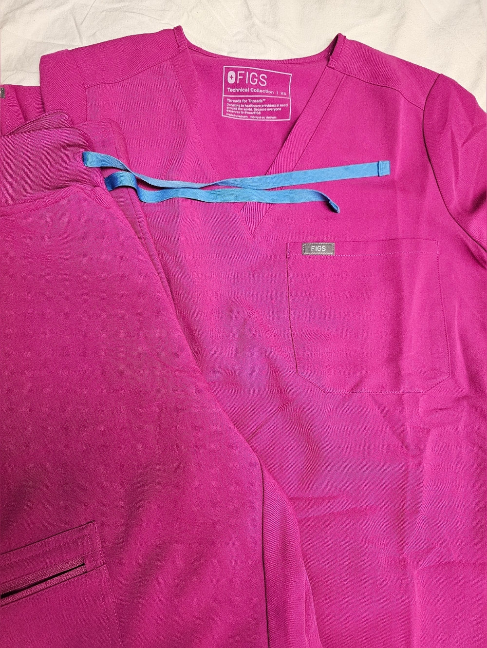 FIGS hot pink with blue drawstring